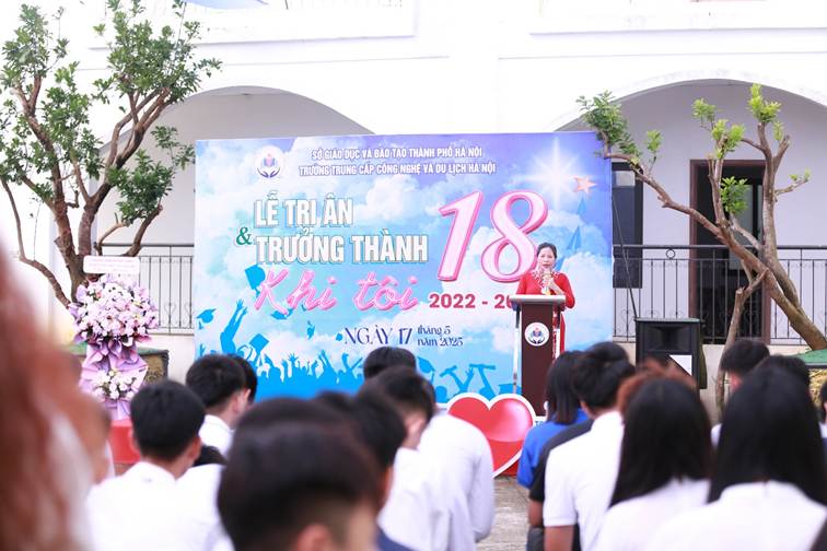 A person standing at a podium with a large sign in front of a crowd

AI-generated content may be incorrect.